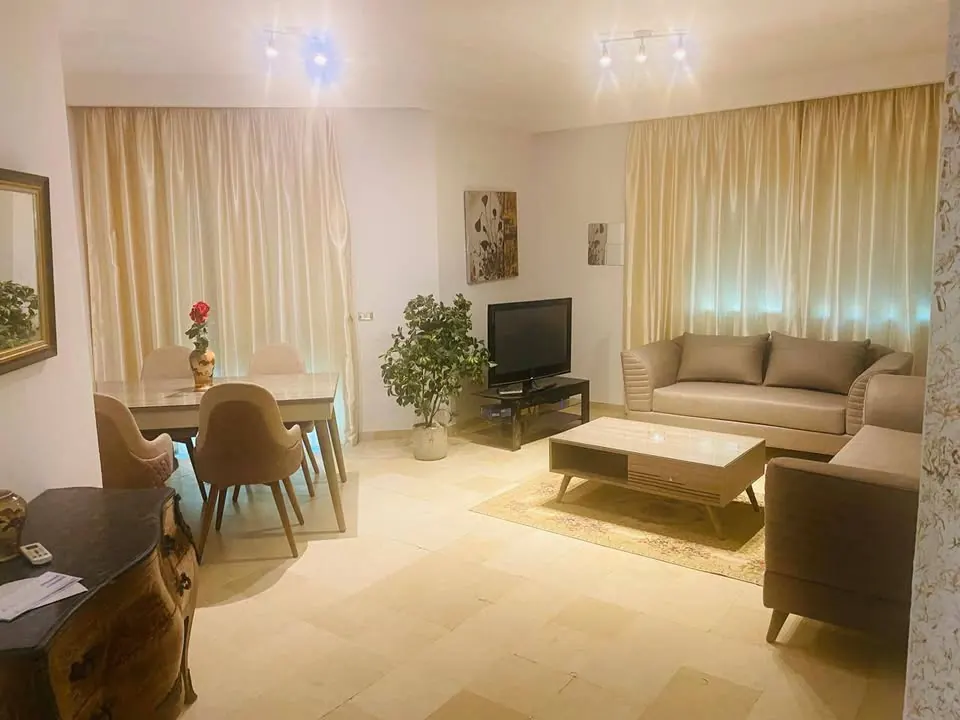 A louer un appartement haut standing en S2 meuble situe a ENNASR 1