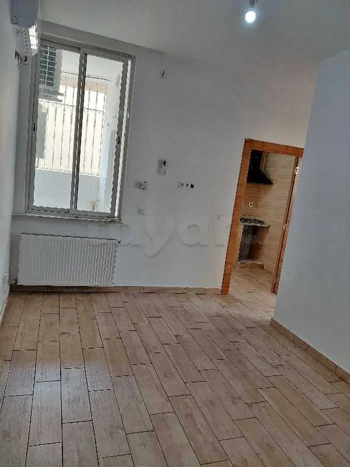 A louer : Coquet rez-de-chaussee de villa (haut standing) S+2 situe a Jardin dEl Menzah 2