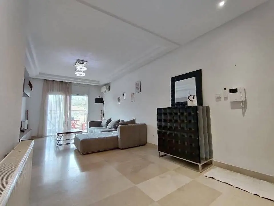 A louer un appartement haut standing en S+2 de 130 m2 situe a ENNASR 2 ( meuble ou vide )